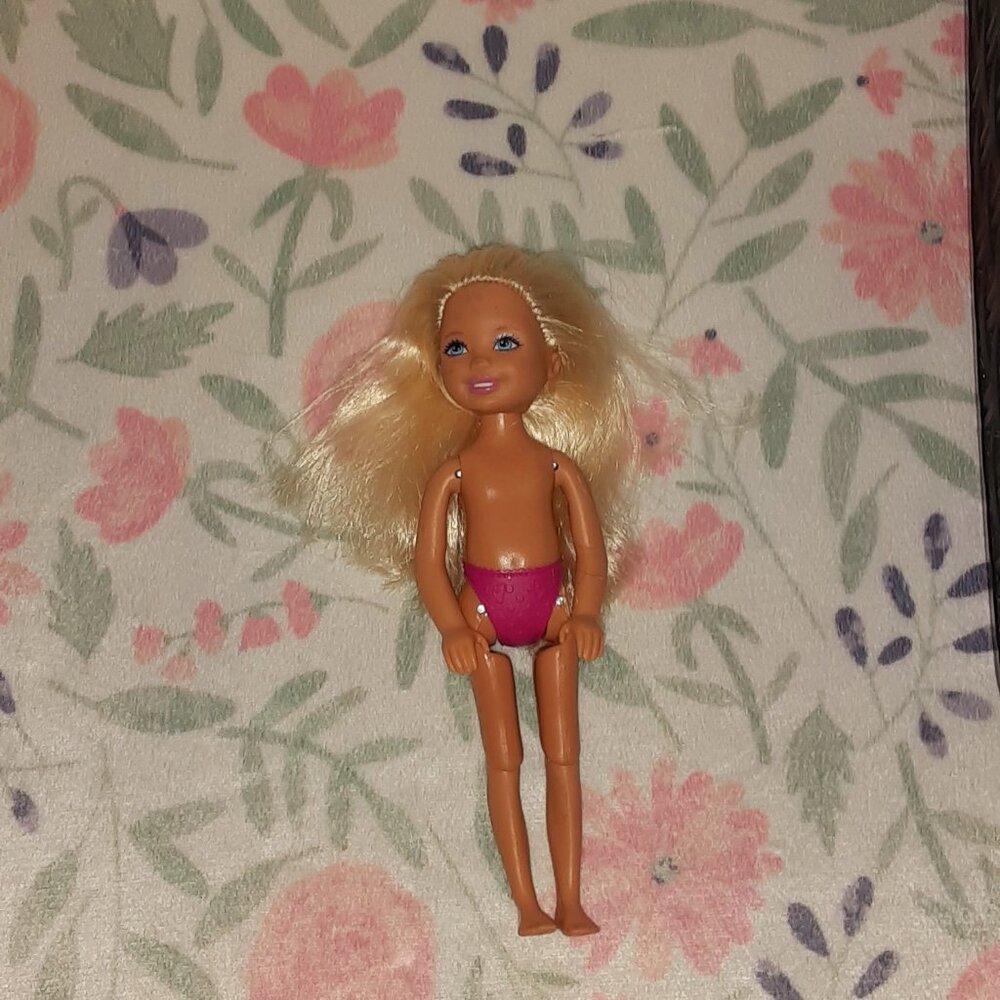 Mattel's Chelsea Barbie's little sister blonde hair articulated knees